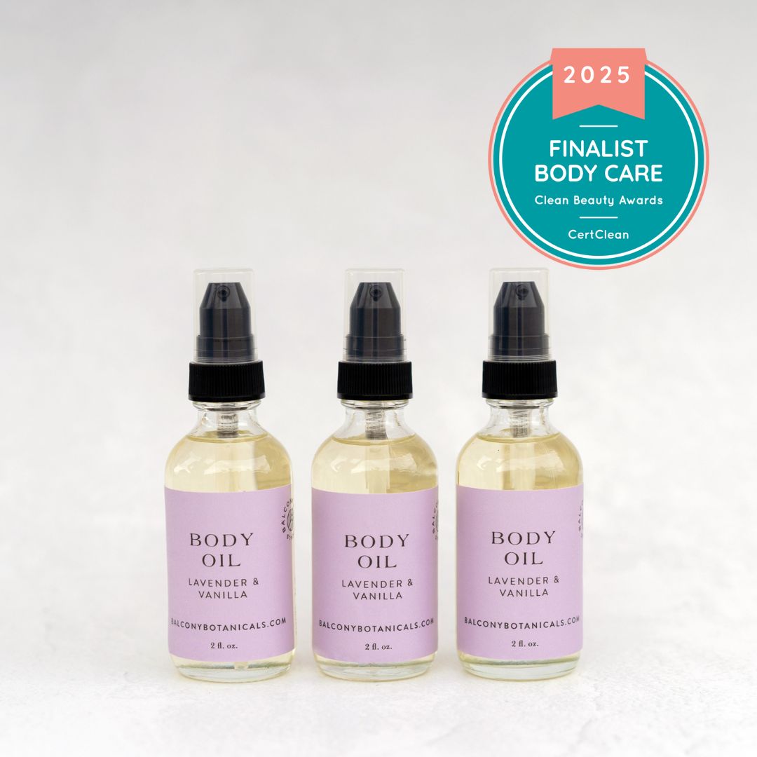 Three bottles of Balcony Botanicals lavender and vanilla body oil on a white background with a 2025 finalist badge for CertClean Body Care.