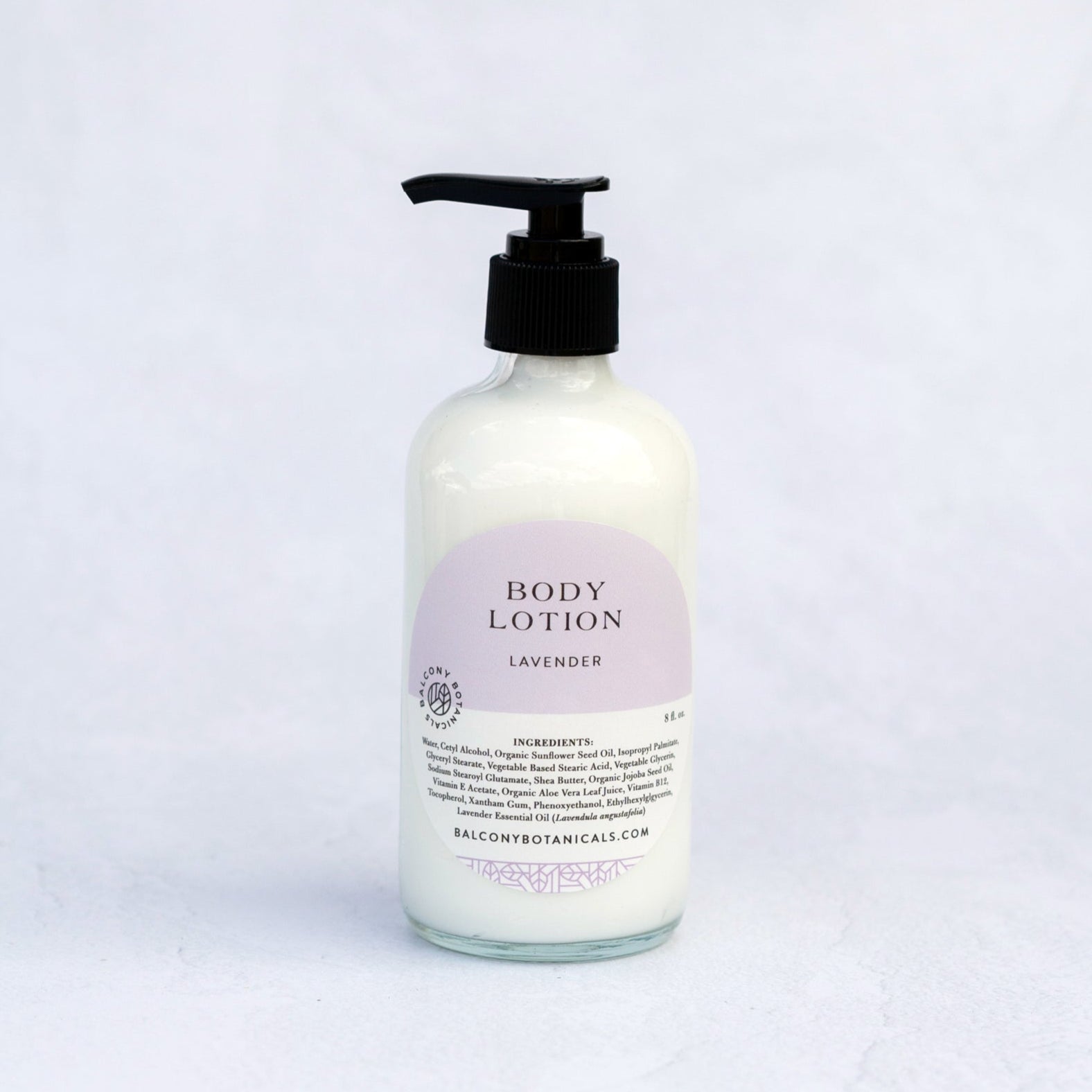 Clear glass bottle of Lavender Body Lotion. 