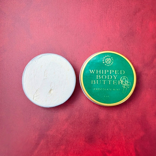 chocolate mint body butter in gold tin with green and gold label